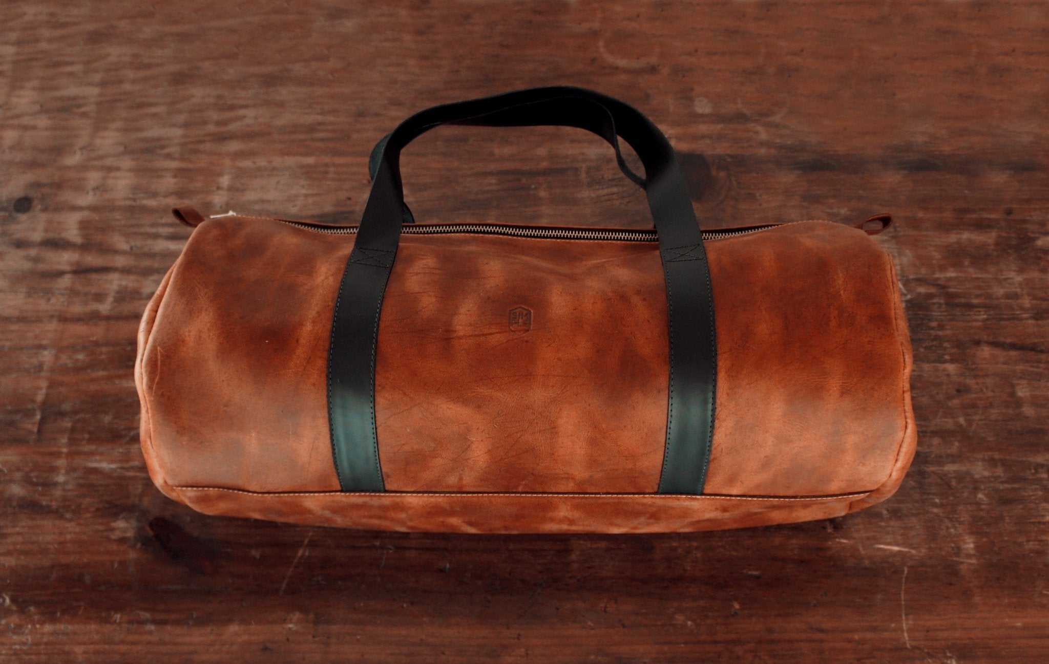 Simple Leather duffle bag, brown with black handles
